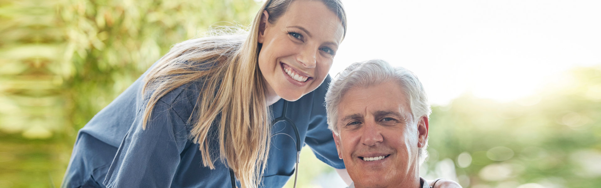 nurse and old man in portrait with smile, trust and comfort in lounge at nursing home